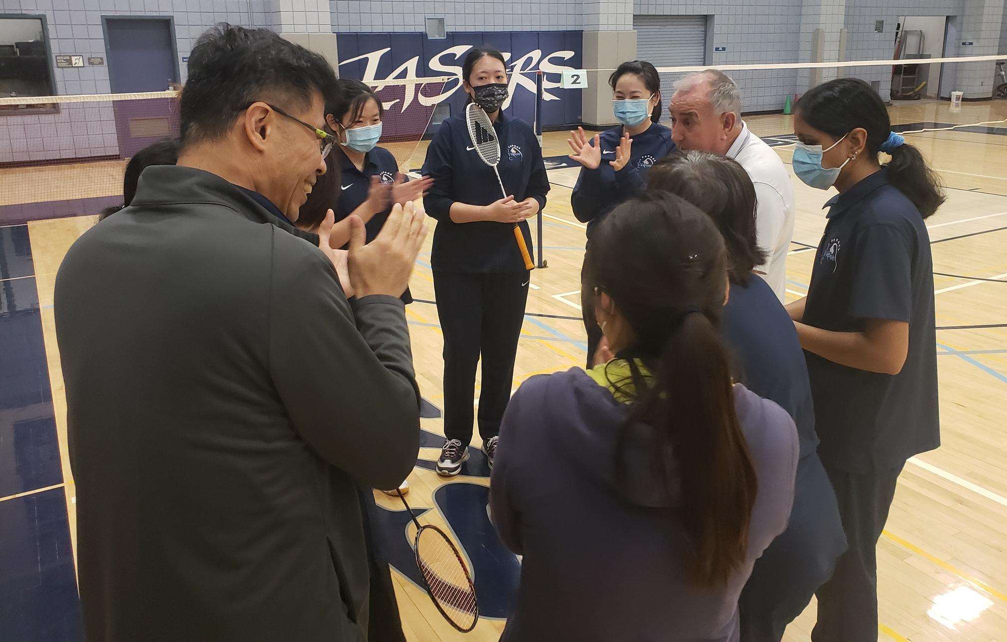 Women's badminton team wraps up conference play unbeaten